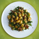 German potato salad made from gnocchi instead of potatoes, with bacon and parsley